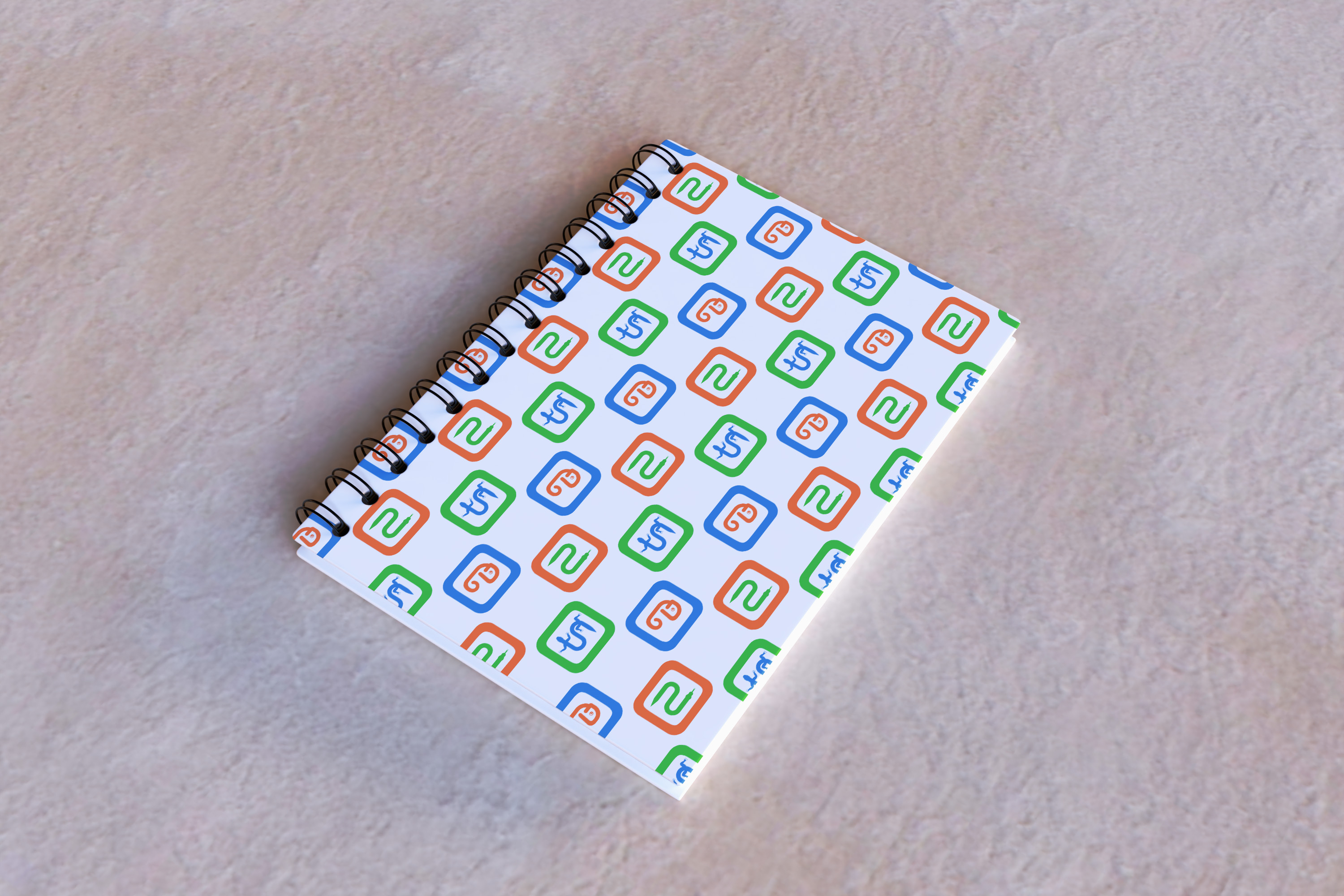 a notebook with a pattern of the Slithering Scholars icons